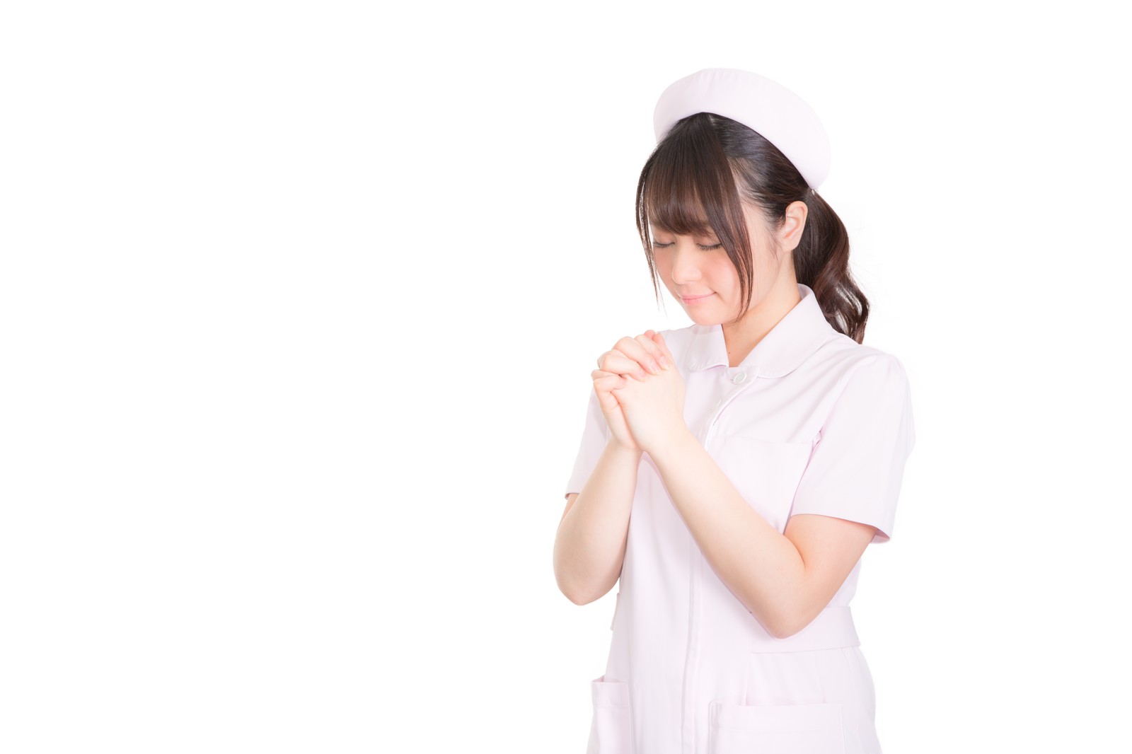 祈るナース